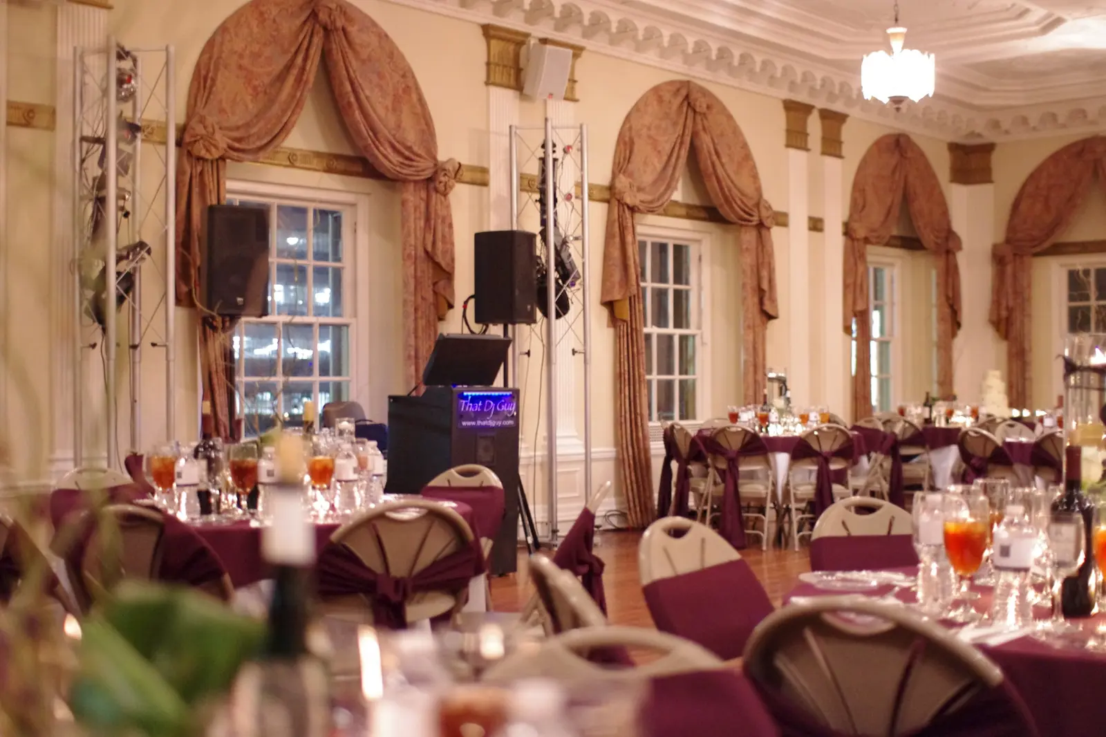 A clean ThatDjGuy sound and lighting setup in a formal reception room