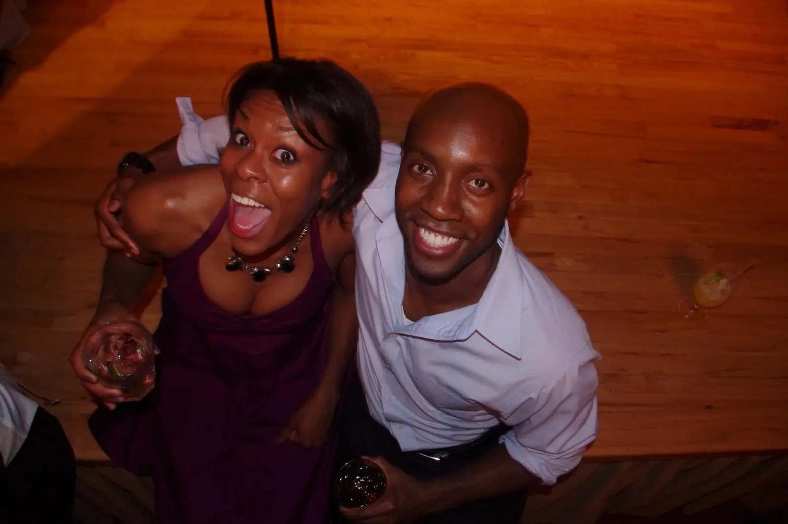 Two guests smiling together on the dance floor